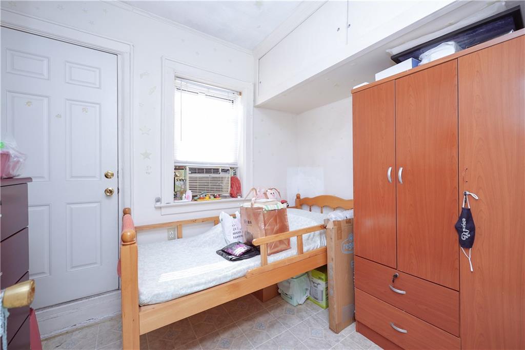 1216 Tabor Court Brooklyn, NY 11219 - Photo 10 of 20 a view of a bathroom with tub and sink