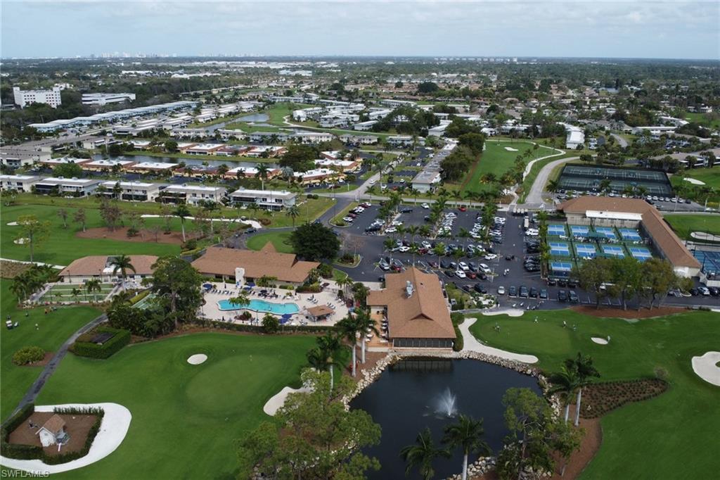 348 Tern Drive, Unit 4 Naples, FL 34112 - Photo 21 of 27 an aerial view of multiple house