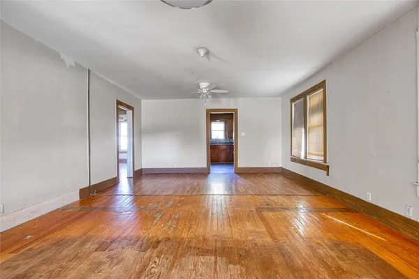 a view of an empty room and window
