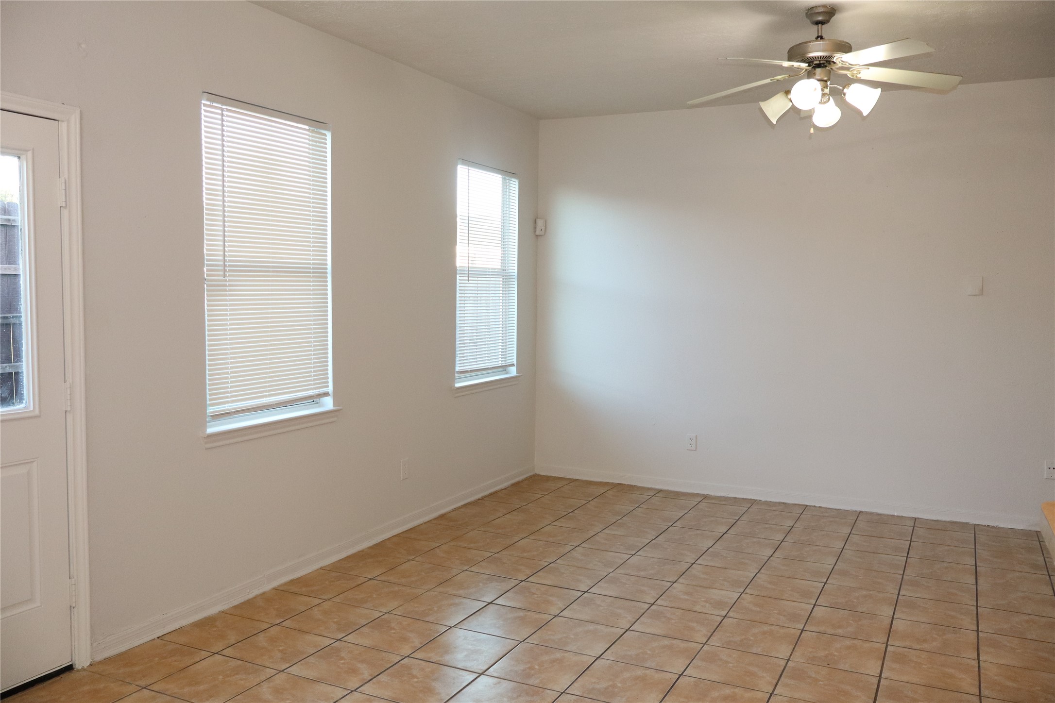 15931 Winston Point Lane Houston, TX 77084 - Photo 4 of 15 a view of an empty room with a window