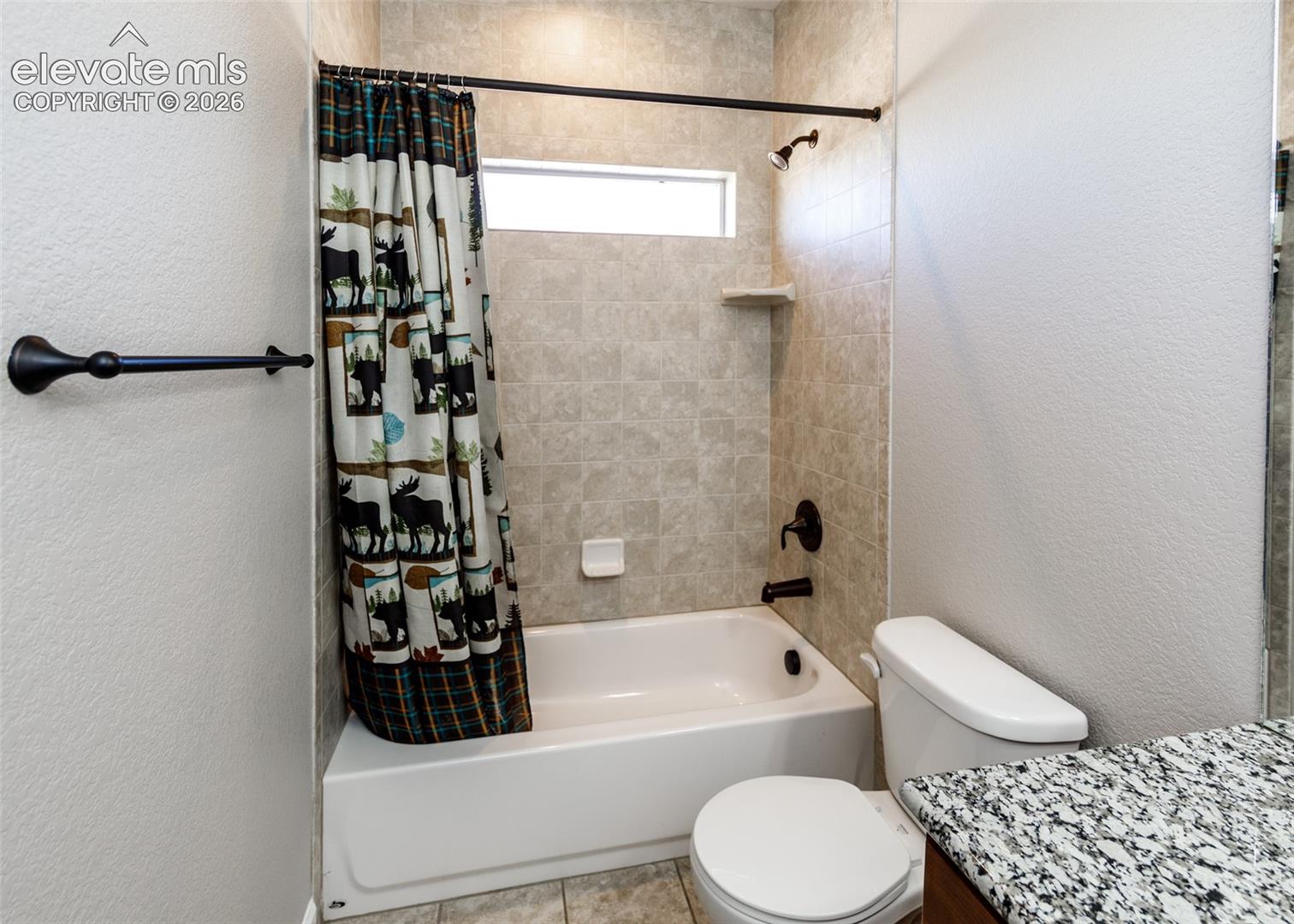 2105 Slocum Road Peyton, CO 80831 - Photo 13 of 26 Custom tile in the main bath/shower.