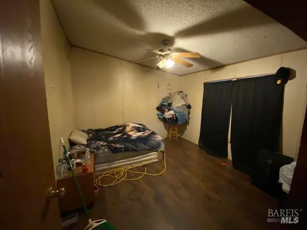 a kitchen with a stove and a refrigerator