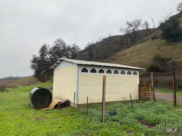 20350 Morgan Valley Road Lower Lake, CA 95457 - Photo 13 of 14 a front view of a house with garden