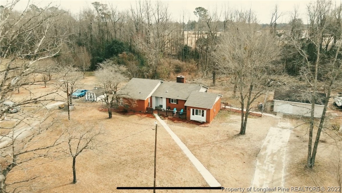 172 Tarheel Road Lumberton, NC 28358 - Photo 1 of 34 a view of a swimming pool with a patio
