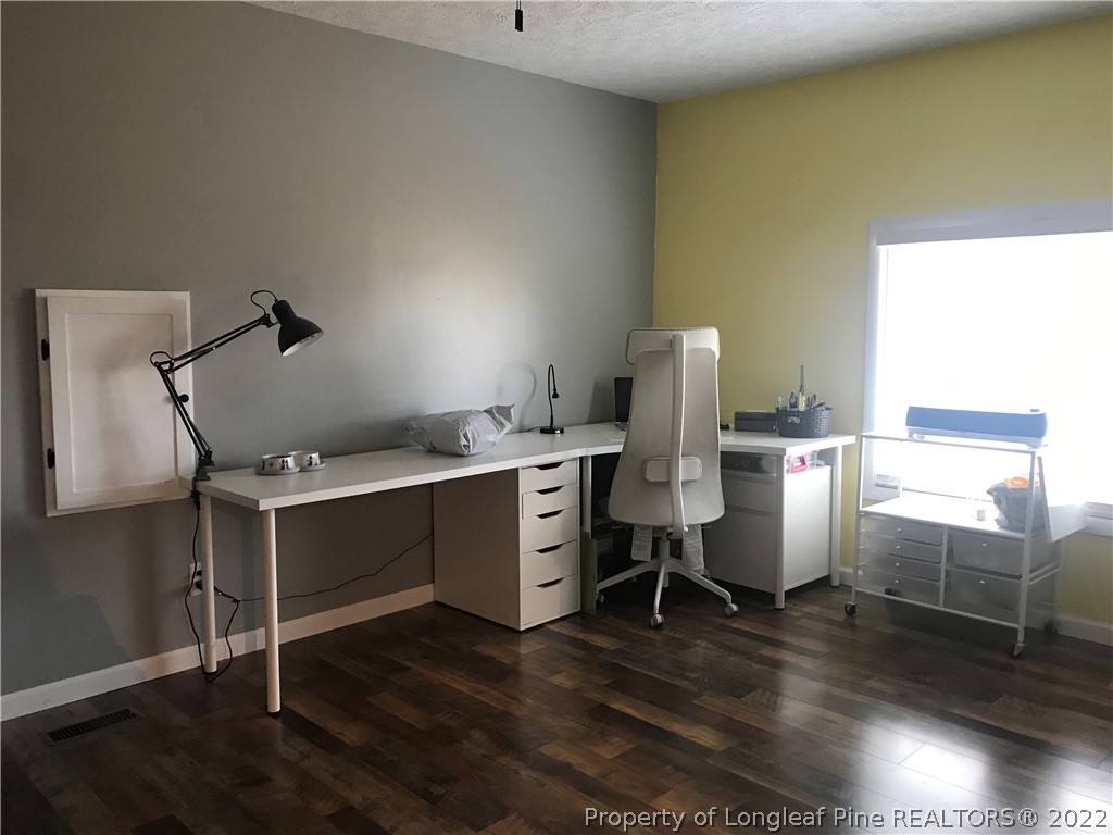 172 Tarheel Road Lumberton, NC 28358 - Photo 10 of 34 a room with furniture a desk and chair