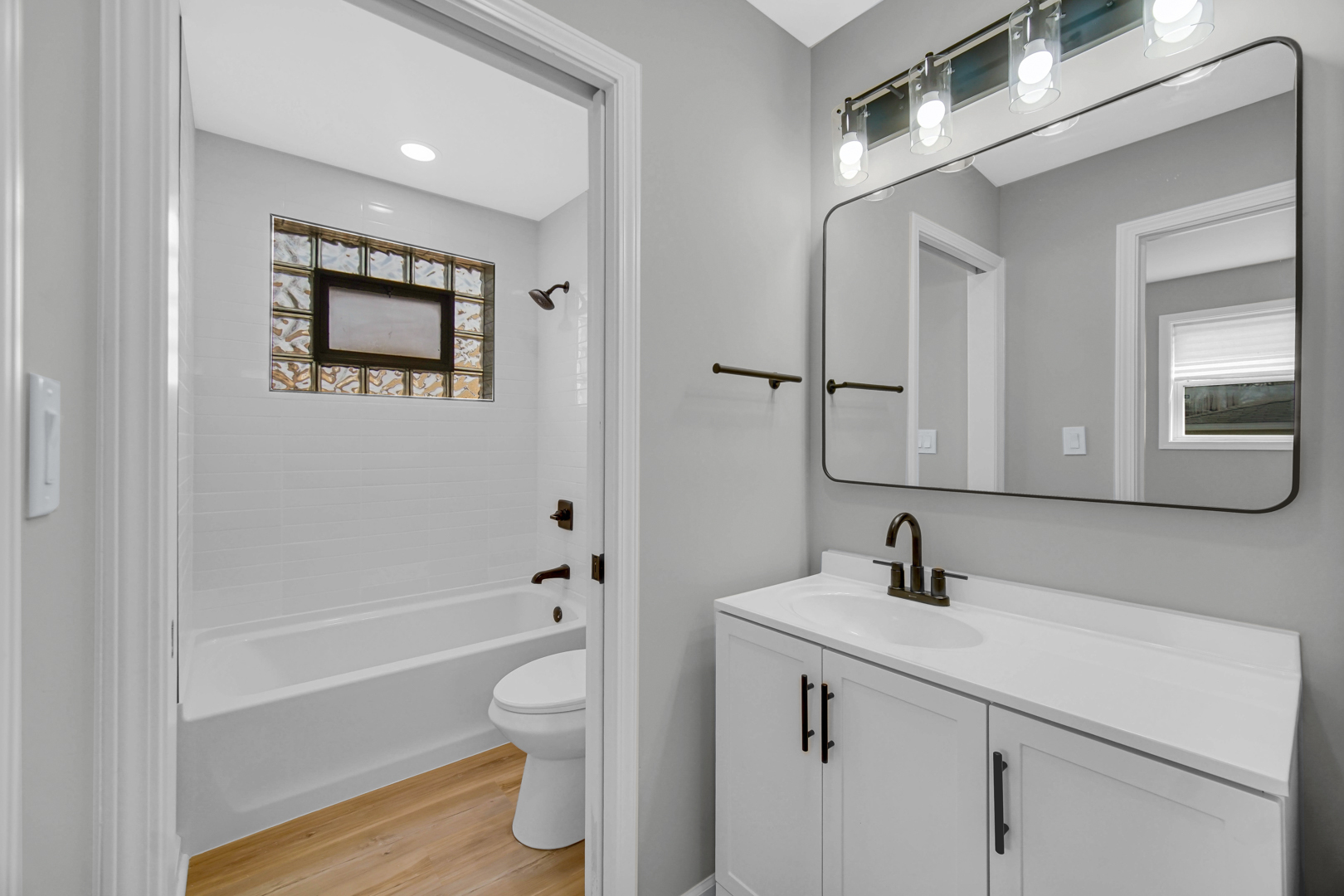 3629 West 84th Street Chicago, IL 60652 - Photo 11 of 23 a bathroom with a sink a toilet and shower