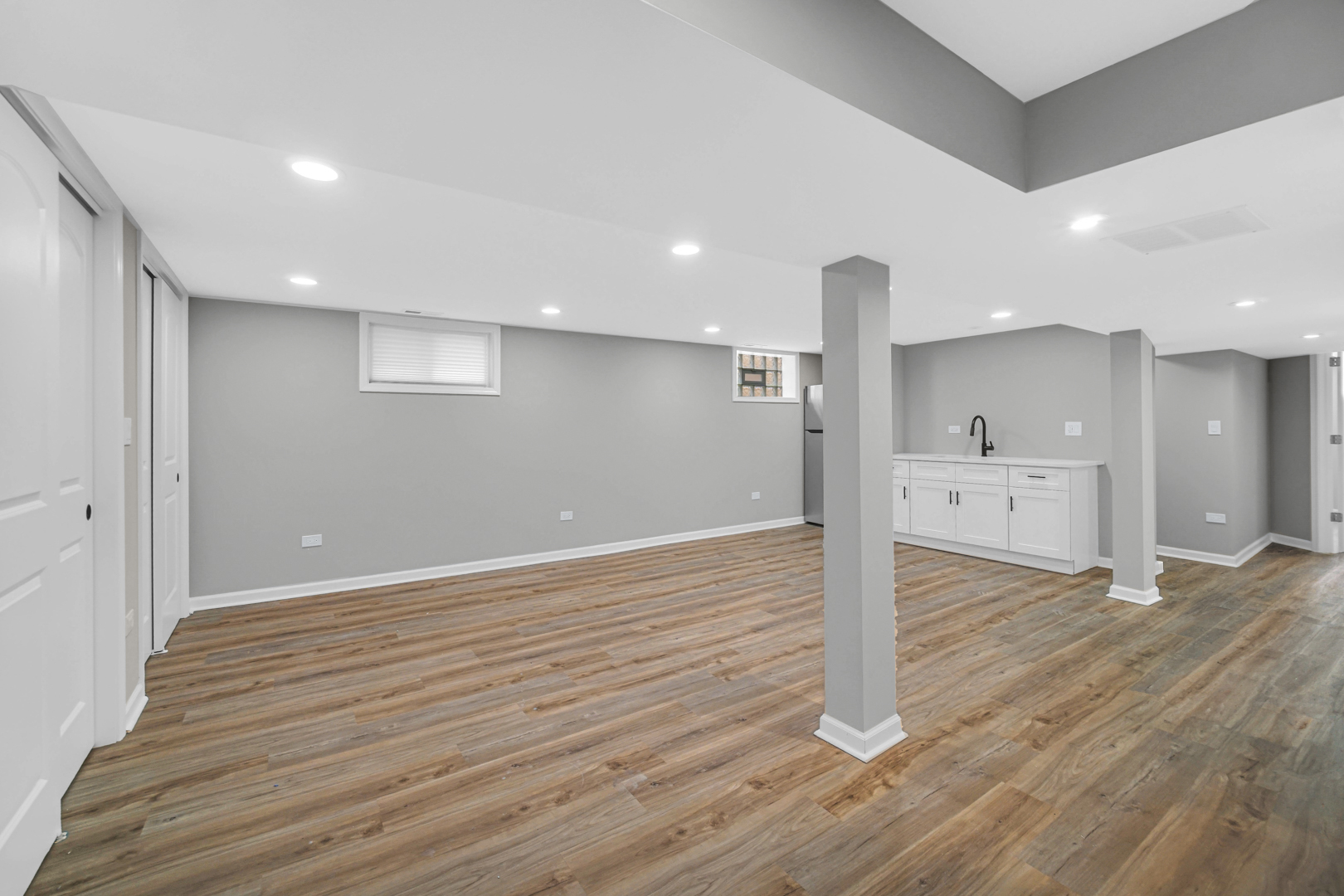3629 West 84th Street Chicago, IL 60652 - Photo 15 of 23 a view of a kitchen with wooden floor and window