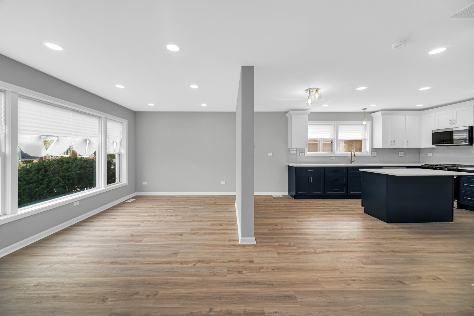 3629 West 84th Street Chicago, IL 60652 - Photo 3 of 23 a large kitchen with stainless steel appliances granite countertop a large counter top and a wooden floors