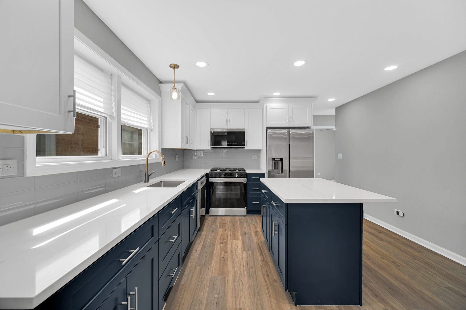 3629 West 84th Street Chicago, IL 60652 - Photo 4 of 23 a kitchen with a sink stove and cabinets