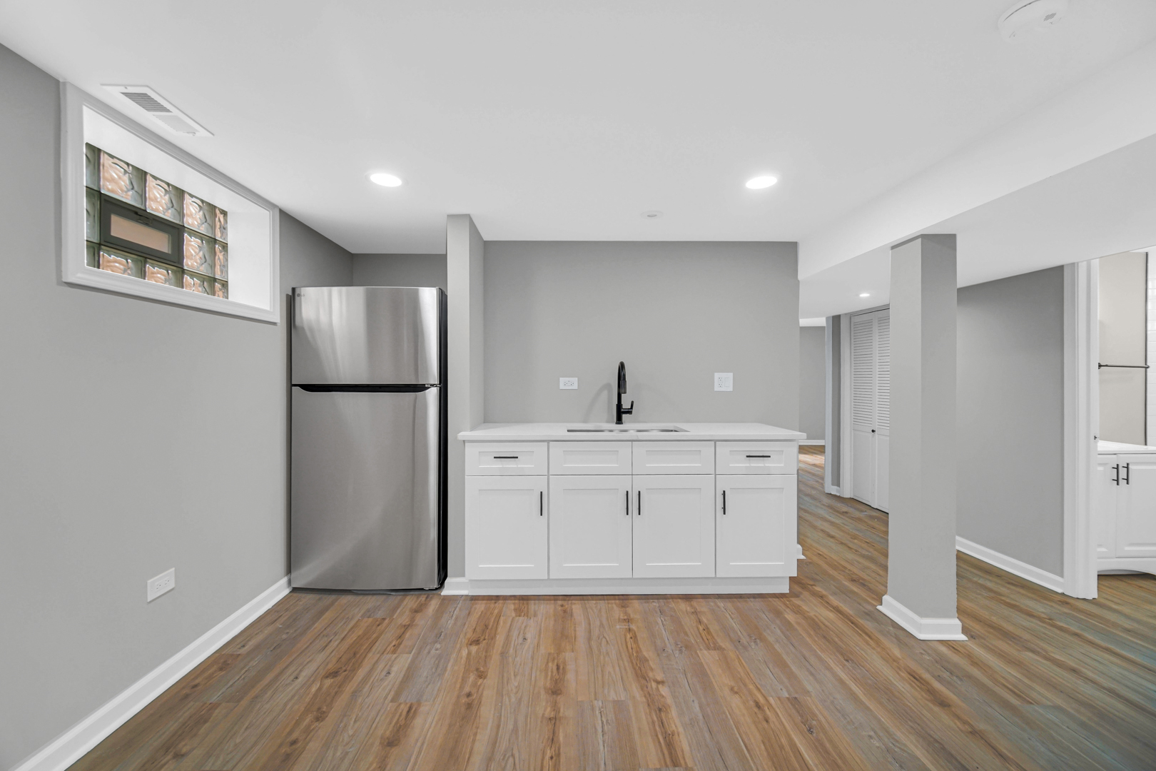 3629 West 84th Street Chicago, IL 60652 - Photo 9 of 23 a kitchen with a refrigerator and a sink