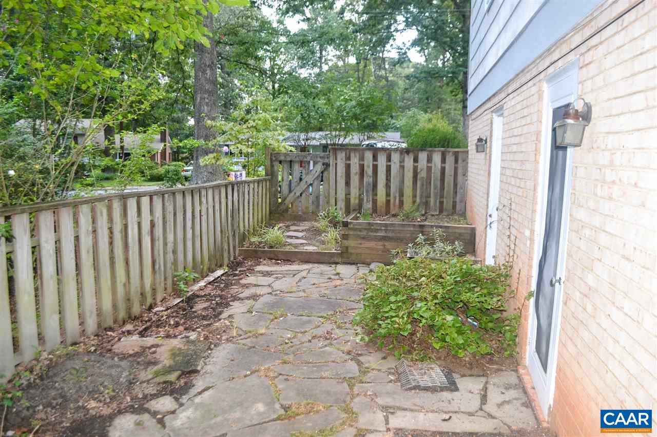 703 Shamrock Road Charlottesville, VA 22903 - Photo 31 of 36 a view of a pathway with a back yard of the house