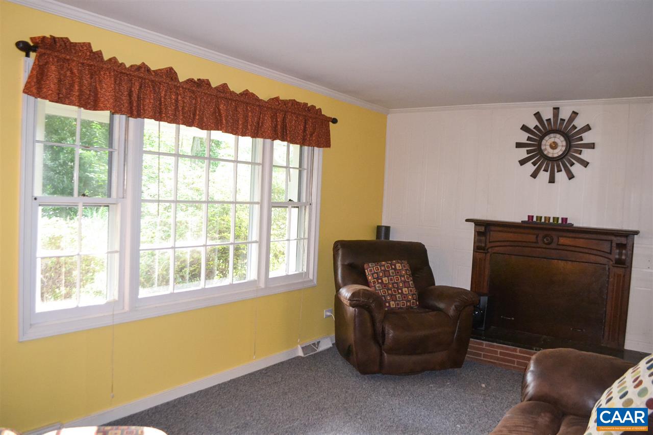 703 Shamrock Road Charlottesville, VA 22903 - Photo 6 of 36 a living room with furniture and a window