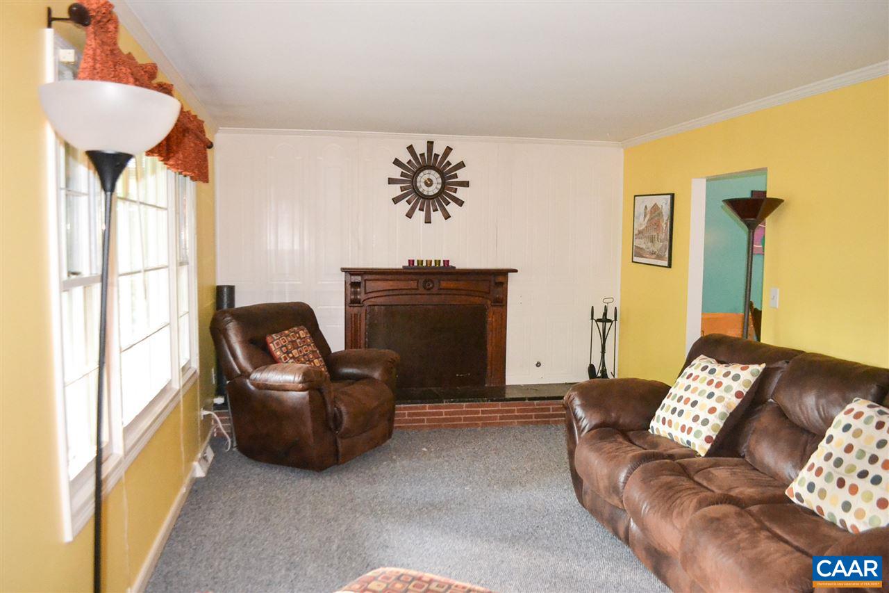 703 Shamrock Road Charlottesville, VA 22903 - Photo 9 of 36 a living room with furniture and a window