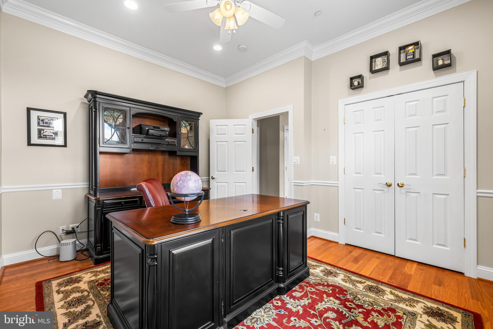 12519 Falls Road Cockeysville, MD 21030 - Photo 30 of 71 a room with furniture and wooden floor