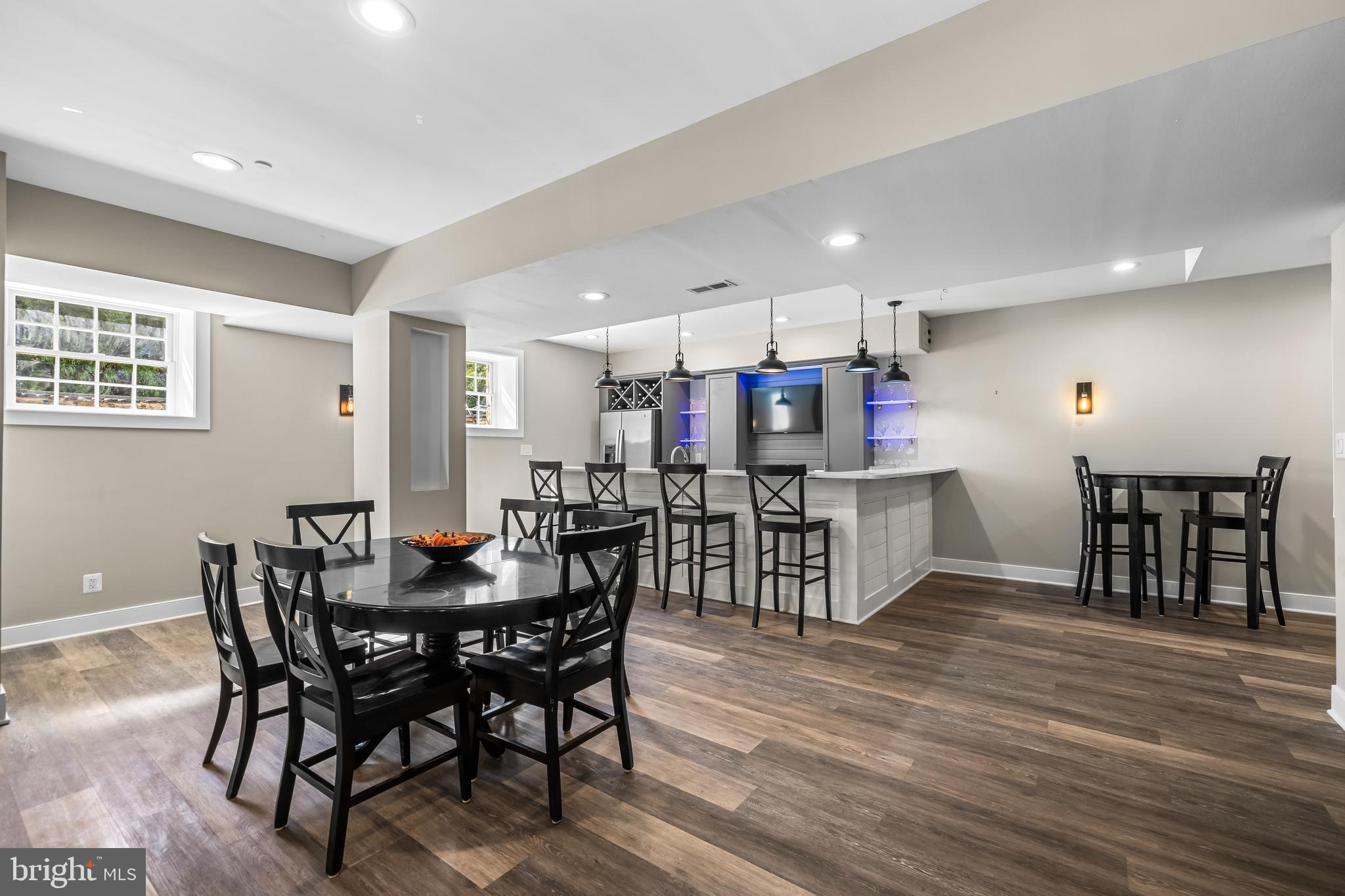 12519 Falls Road Cockeysville, MD 21030 - Photo 55 of 71 a view of a dining area with furniture and wooden floor
