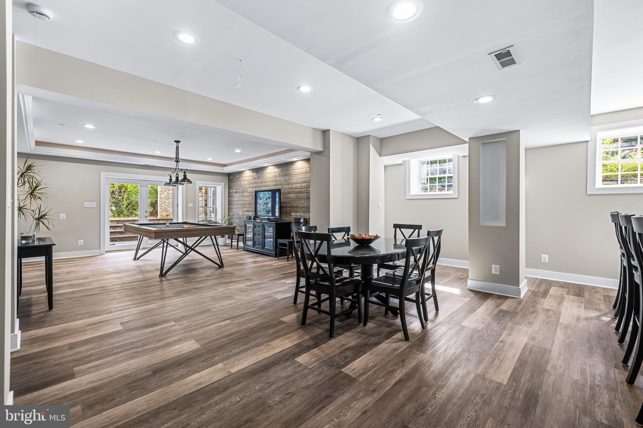 12519 Falls Road Cockeysville, MD 21030 - Photo 60 of 71 a view of a dining room with furniture and wooden floor