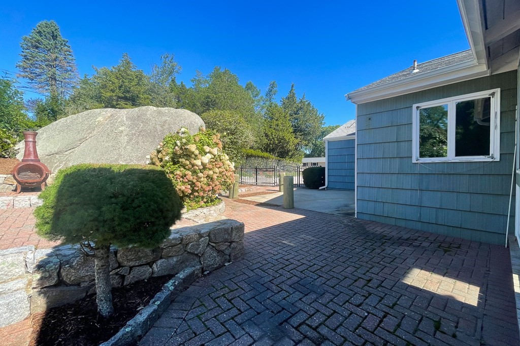 20 Locust Road Cohasset, MA 02025 - Photo 12 of 41 a view of a backyard