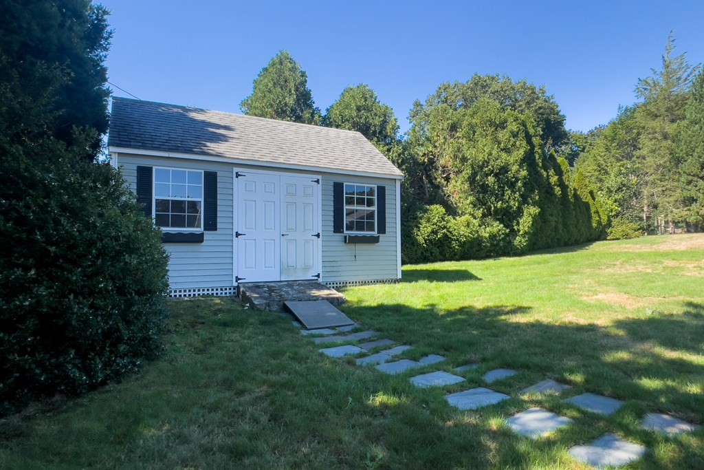 20 Locust Road Cohasset, MA 02025 - Photo 18 of 41 a view of backyard of house with green space
