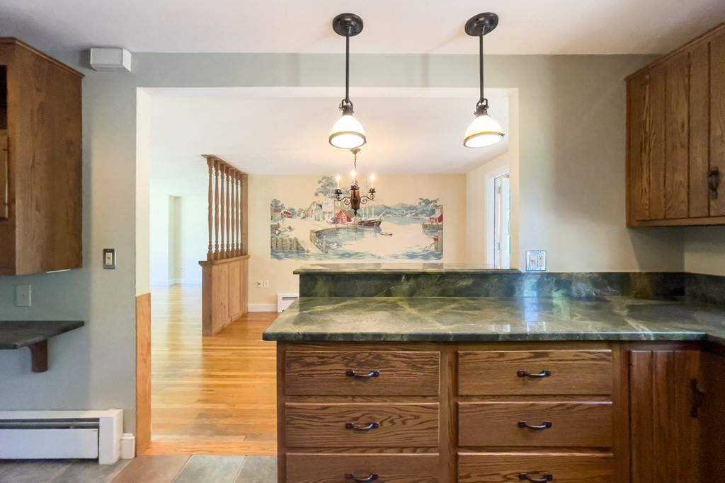 20 Locust Road Cohasset, MA 02025 - Photo 23 of 41 a view of a kitchen with granite countertop cabinets