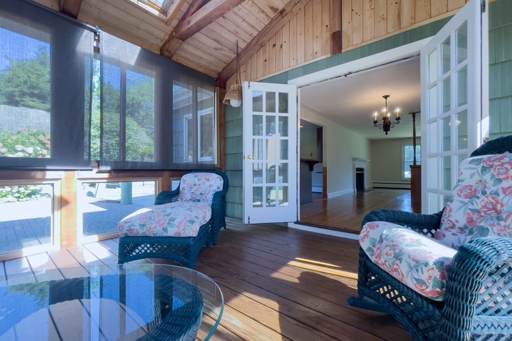20 Locust Road Cohasset, MA 02025 - Photo 26 of 41 a living room with furniture and a large window