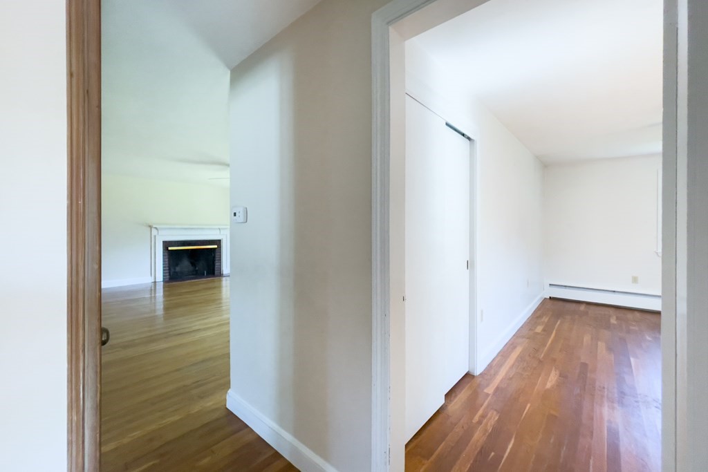20 Locust Road Cohasset, MA 02025 - Photo 29 of 41 a view of a hallway with wooden floor