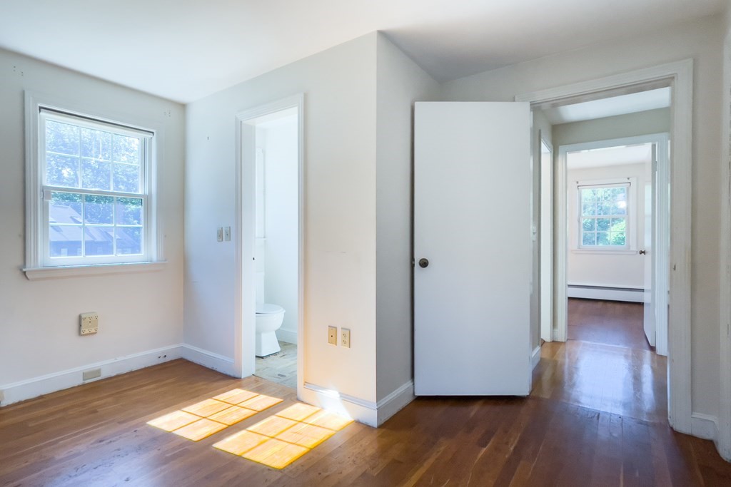 20 Locust Road Cohasset, MA 02025 - Photo 32 of 41 a view of livingroom with hardwood floor and hallway