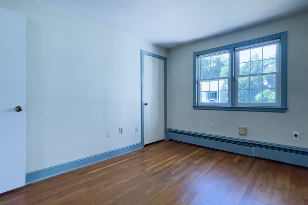 20 Locust Road Cohasset, MA 02025 - Photo 33 of 41 a view of empty room with wooden floor and fan