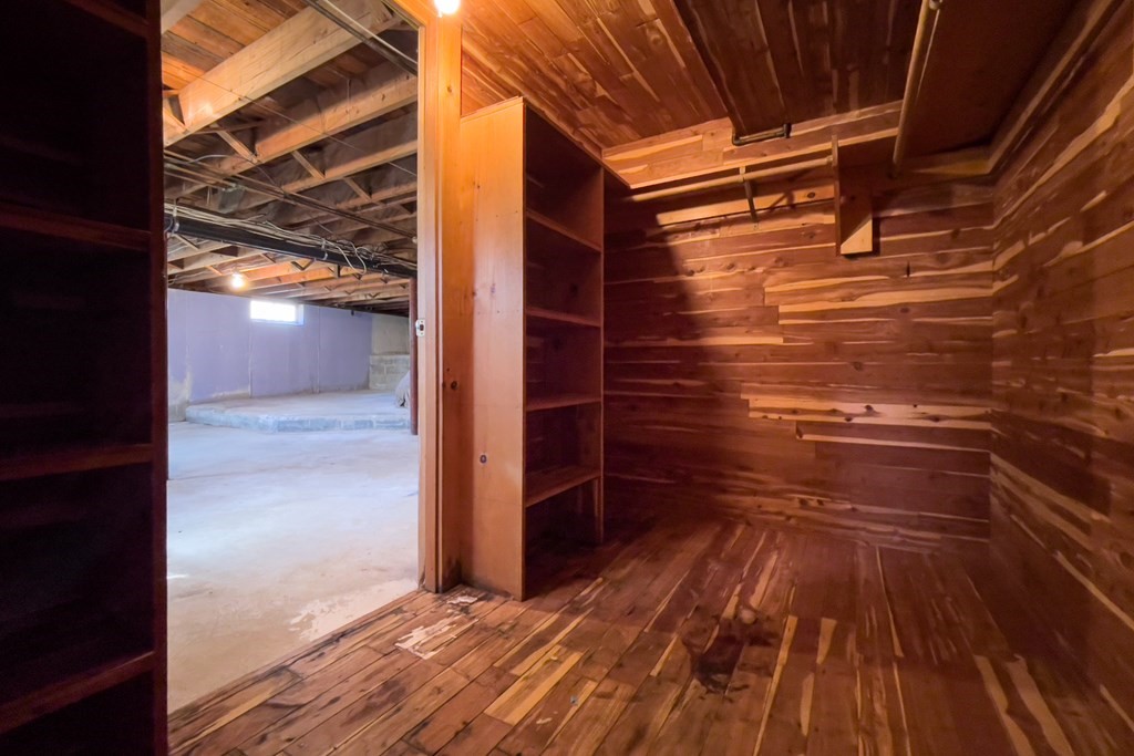 20 Locust Road Cohasset, MA 02025 - Photo 38 of 41 a view of walk in closet with wooden floor