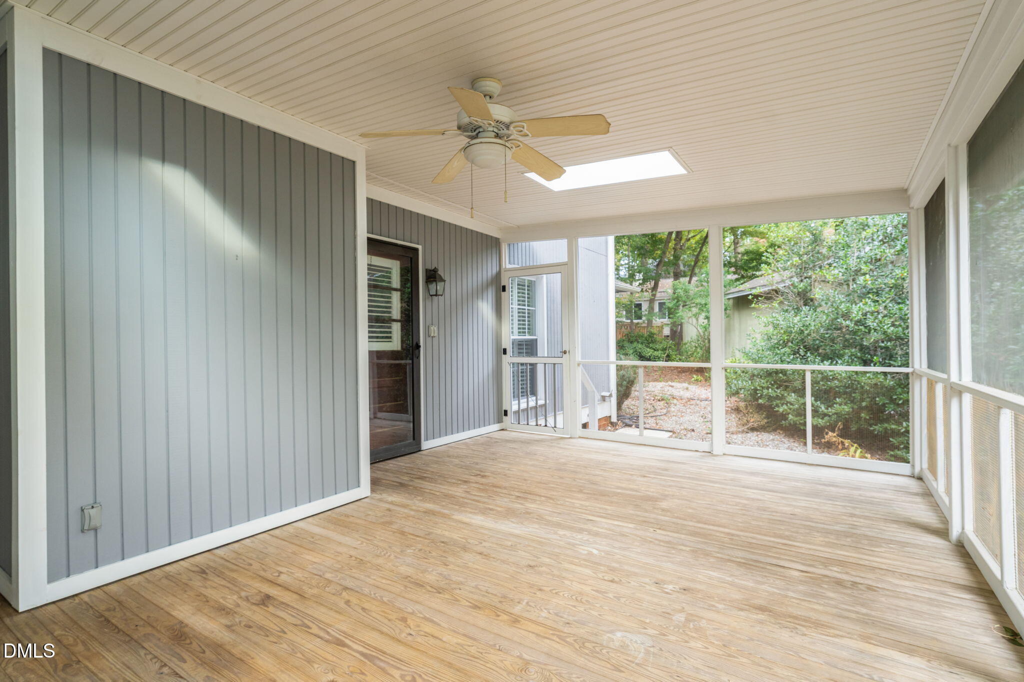 2860 Rue Sans Famille Raleigh, NC 27607 - Photo 29 of 40 a view of a livingroom with a ceiling fan and window