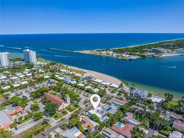 a view of a dining room with furniture and window