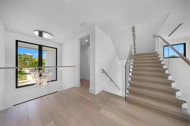 a view of a city with an ocean