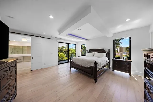 a view of a patio with couches and a fire pit