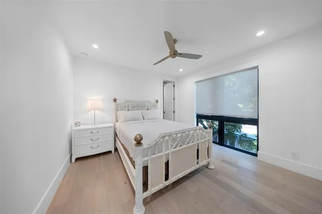 a view of a swimming pool with chairs