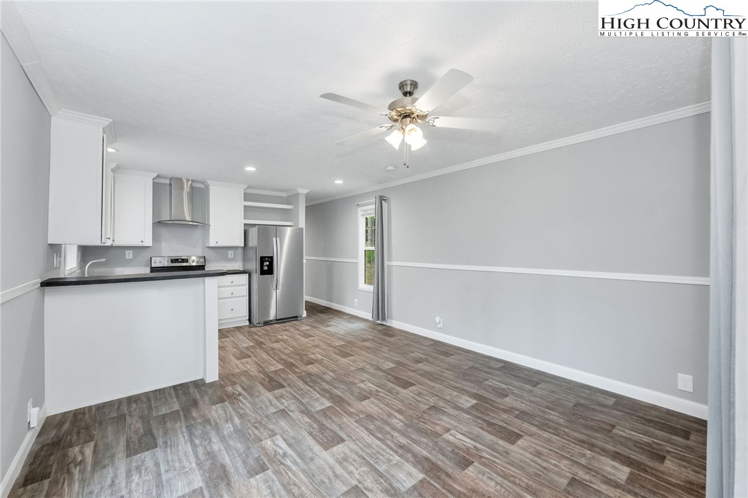 939 Don Bare Road Jefferson, NC 28640 - Photo 12 of 22 a view of a kitchen with a sink and a window