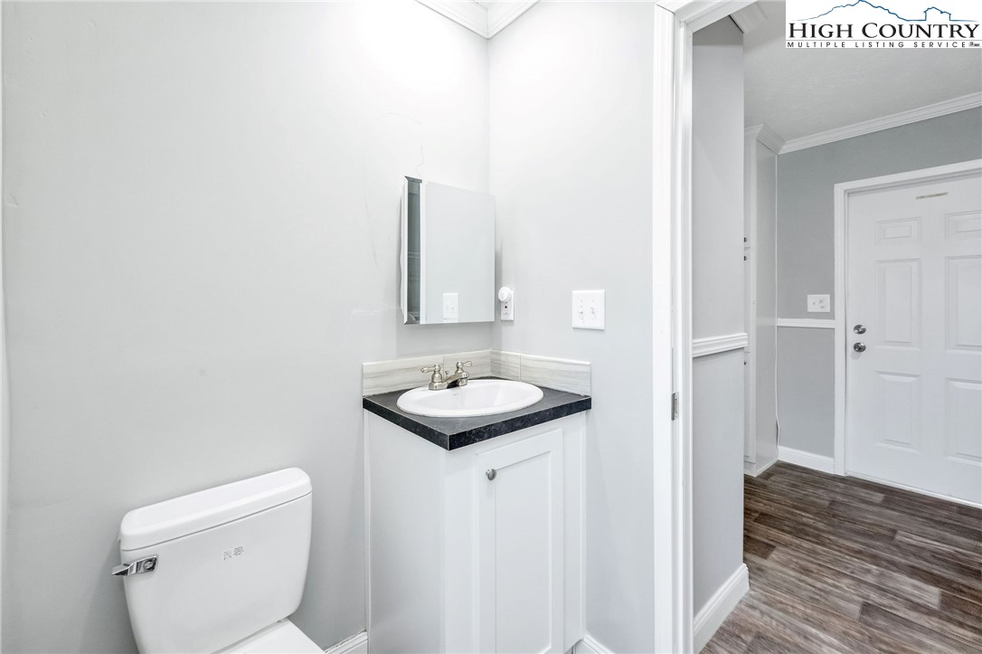 939 Don Bare Road Jefferson, NC 28640 - Photo 17 of 22 a bathroom with a sink and toilet