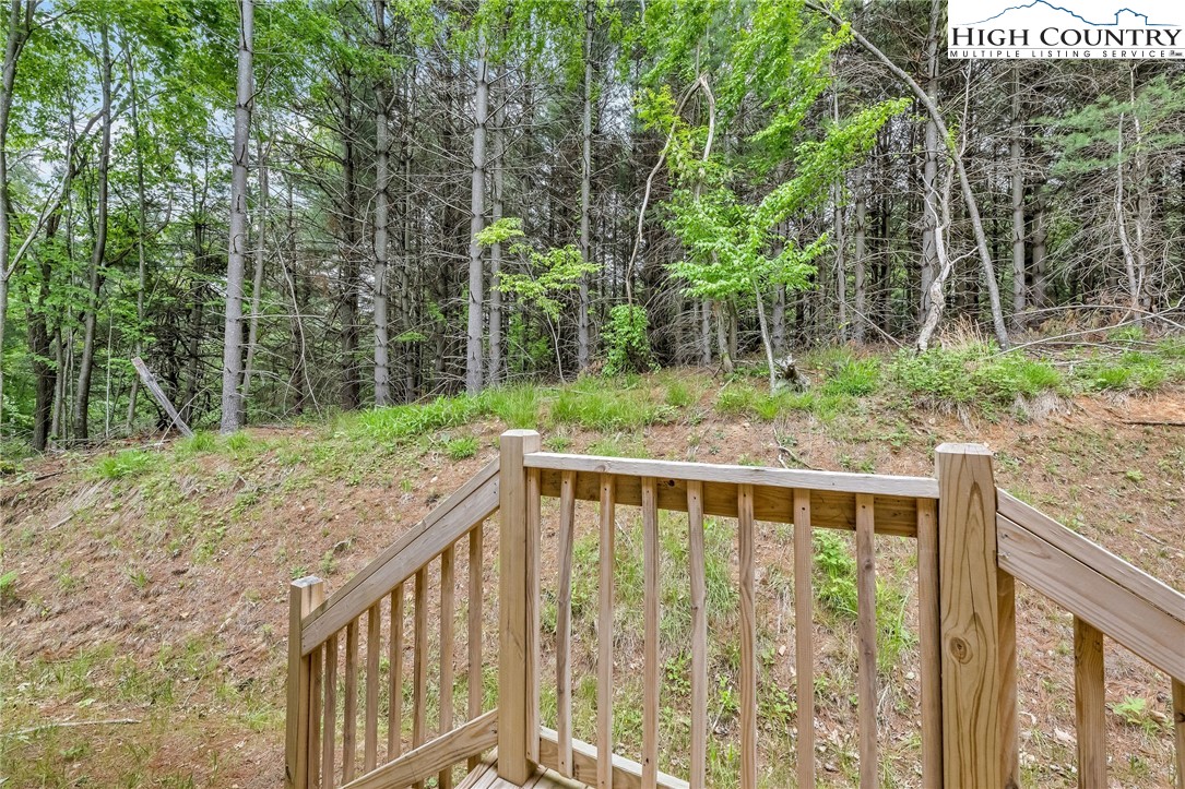 939 Don Bare Road Jefferson, NC 28640 - Photo 21 of 22 a view of balcony with trees