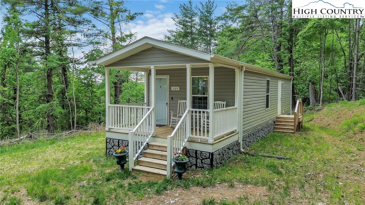 939 Don Bare Road Jefferson, NC 28640 - Photo 3 of 22 a view of a house with a yard