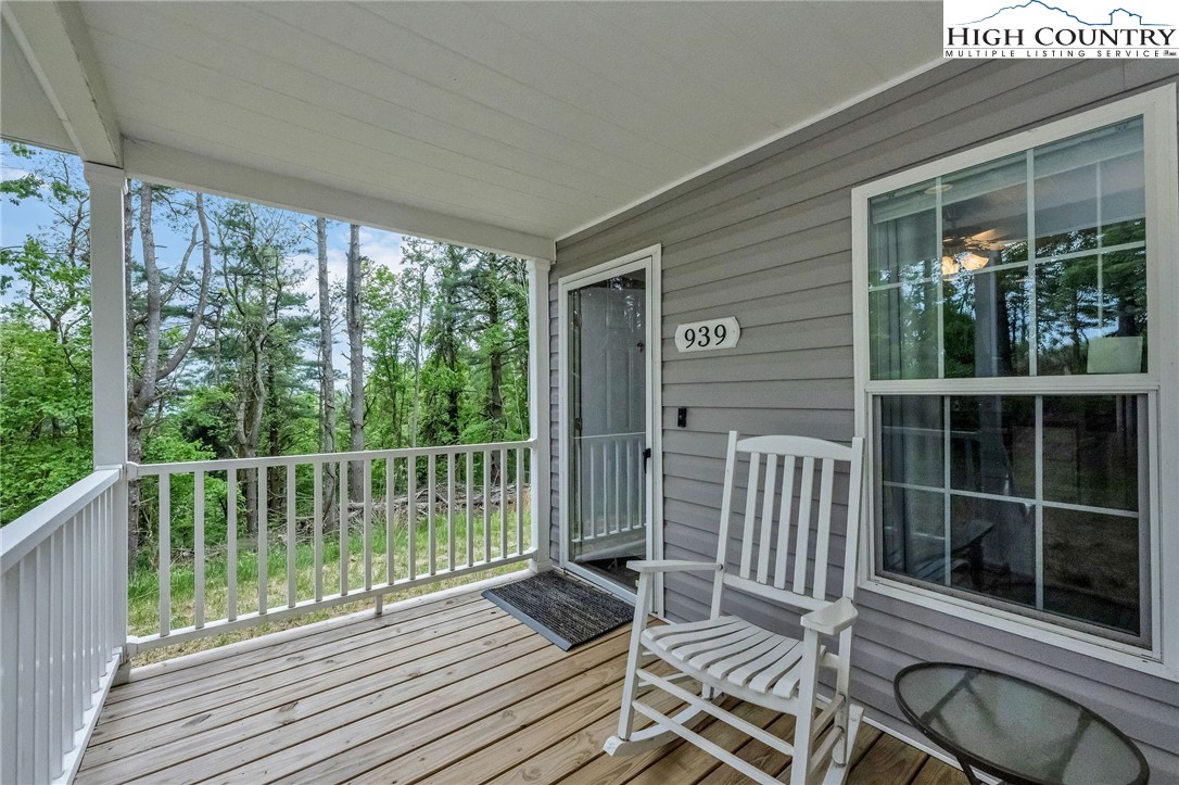 939 Don Bare Road Jefferson, NC 28640 - Photo 8 of 22 a view of a balcony with wooden floor
