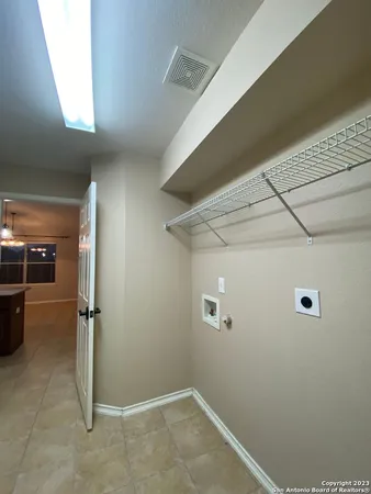 a view of a room with rack on the wall