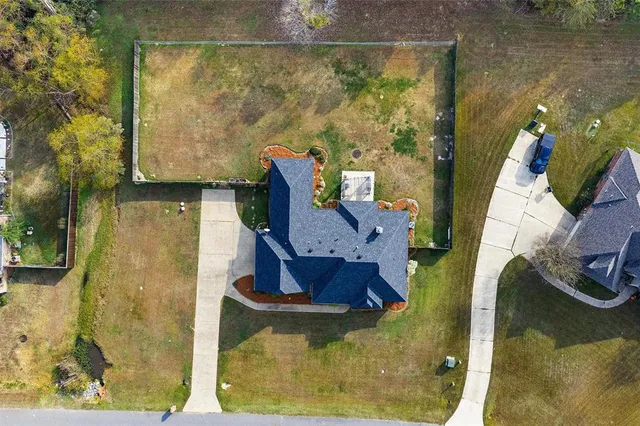 a picture of a bathroom with a shower