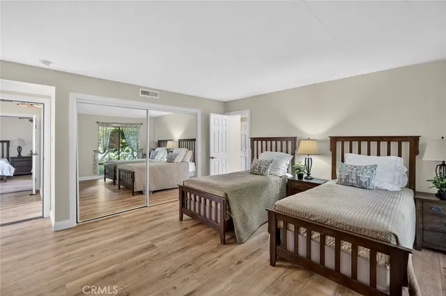 a view of a glass door and wooden floor