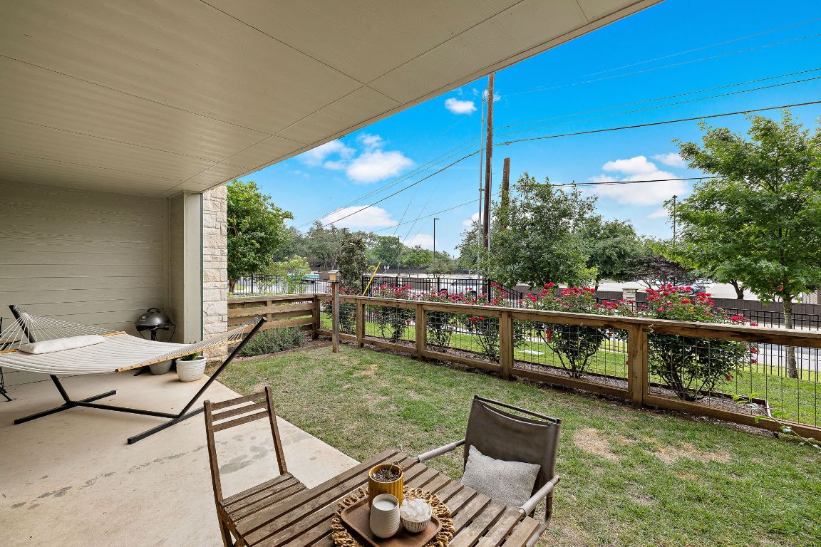 4704 Sunset Trail, Unit 1101 Austin, TX 78745 - Photo 20 of 23 Fenced backyard with a patio area