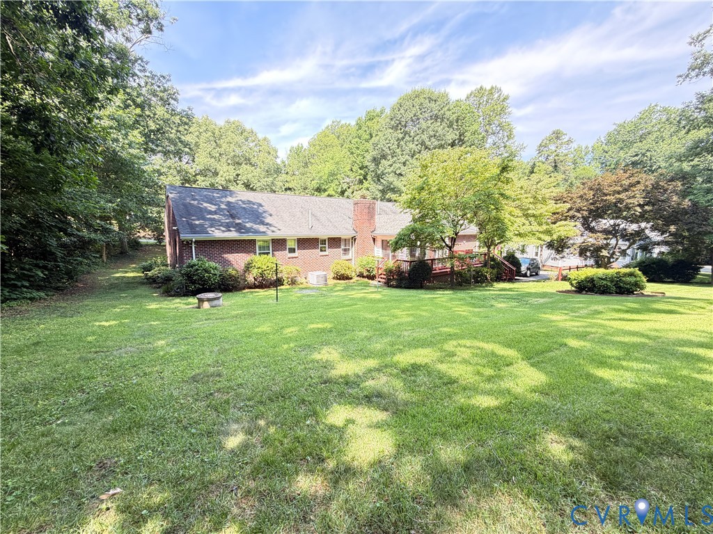 3933 Dunraven Road North Chesterfield, VA 23236 - Photo 11 of 30 a view of a trees in front of a house