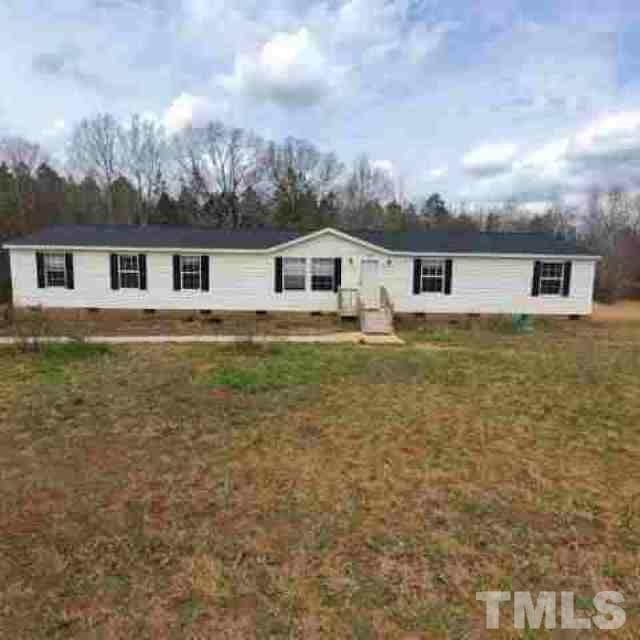 165 Bella Russell Road Manson, NC 27553 - Photo 1 of 7 front view of house with a yard