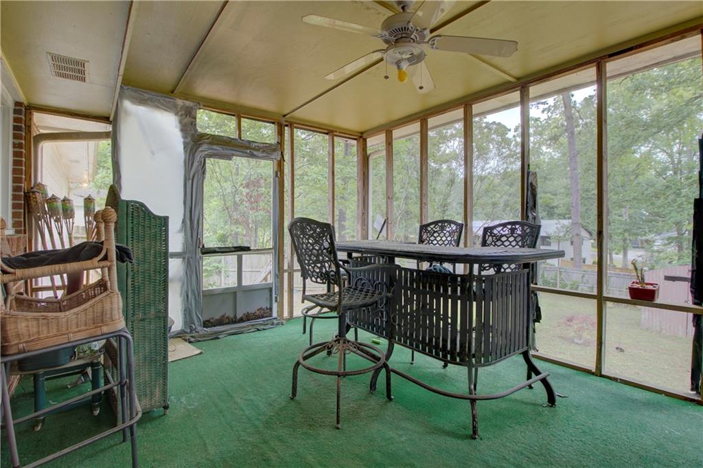 281 Springdale Drive Winder, GA 30680 - Photo 11 of 12 a view of a dining room with furniture window and outside view
