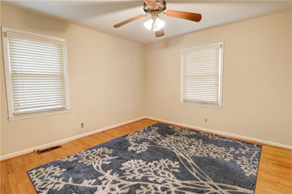 281 Springdale Drive Winder, GA 30680 - Photo 10 of 12 a view of an empty room with a window