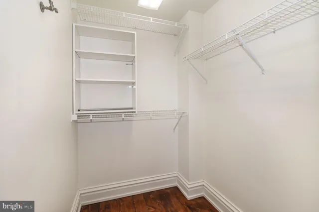 a view of an empty walk in closet