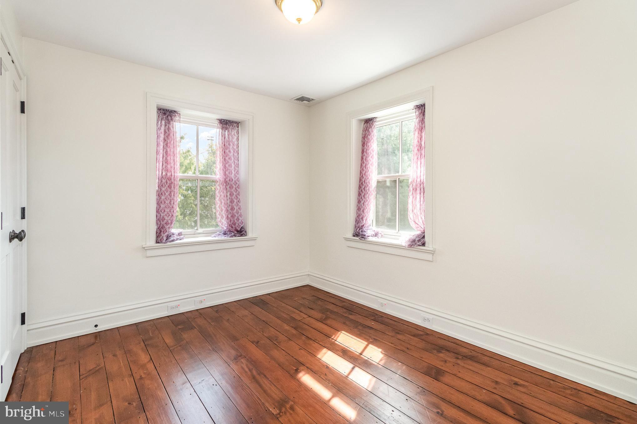 308 East Derry Road Hershey, PA 17033 - Photo 23 of 48 a view of empty room with wooden floor and fan