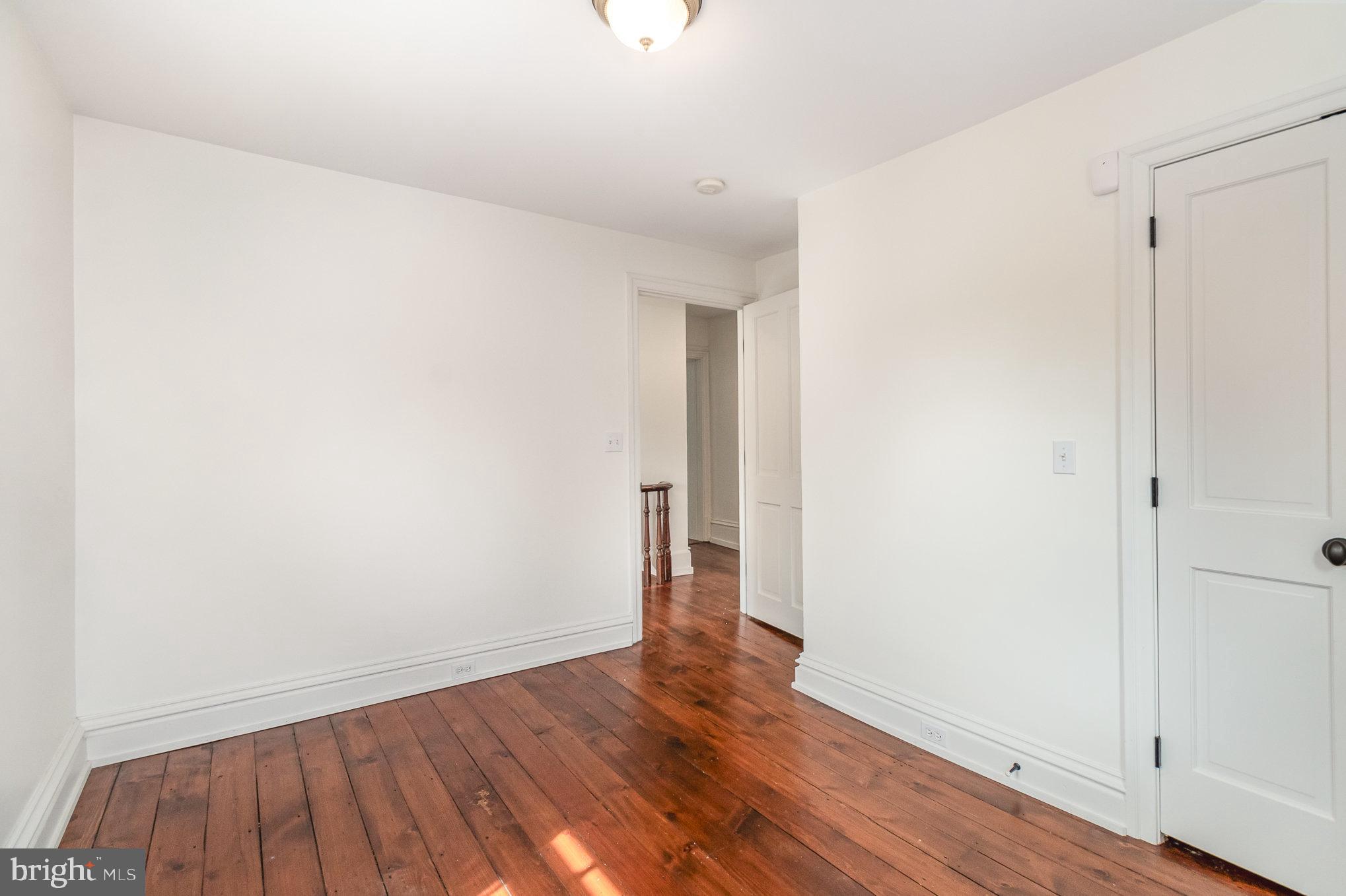 308 East Derry Road Hershey, PA 17033 - Photo 24 of 48 a view of an empty room with wooden floor