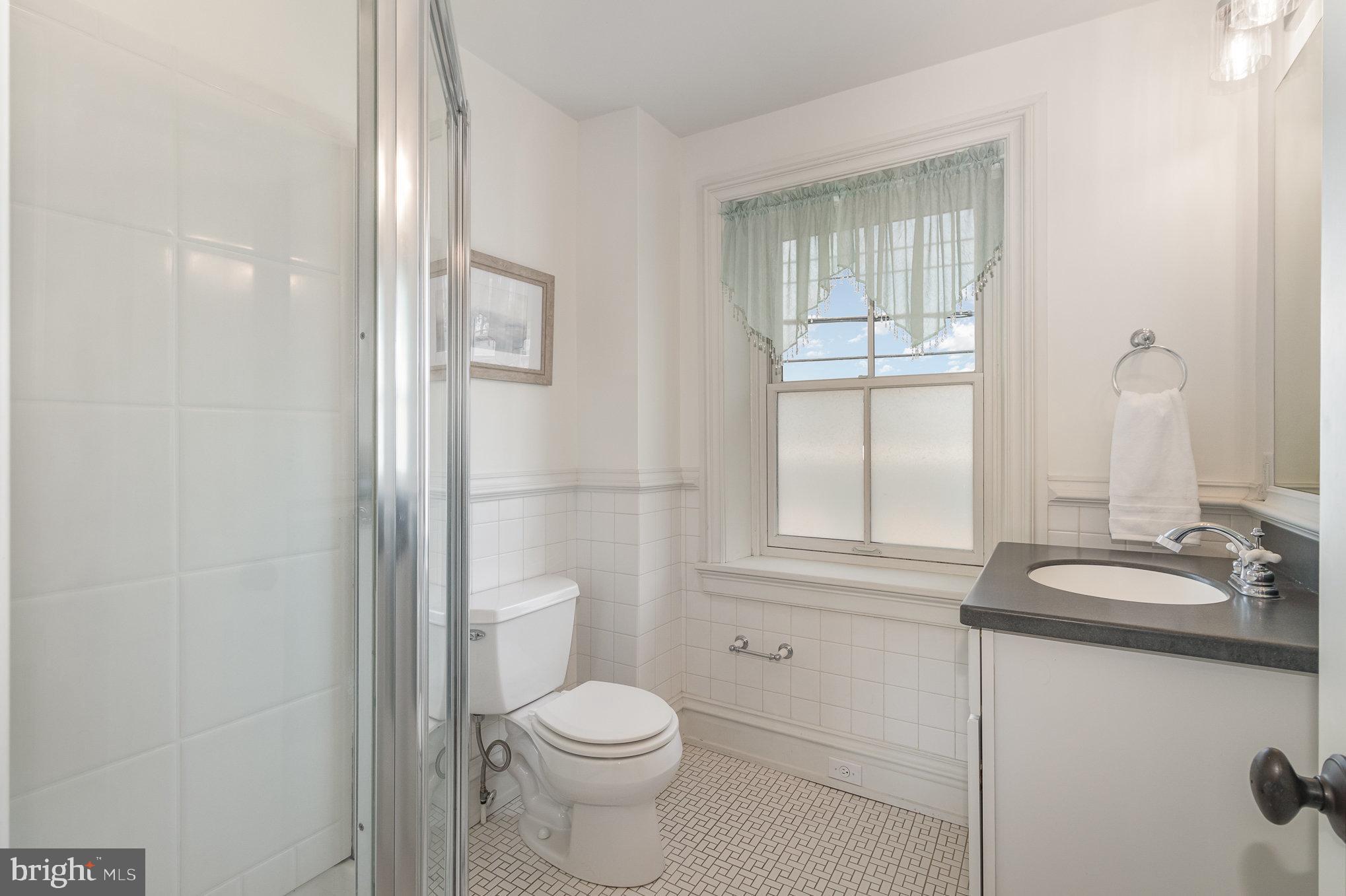 308 East Derry Road Hershey, PA 17033 - Photo 27 of 48 a bathroom with a granite countertop toilet sink and mirror